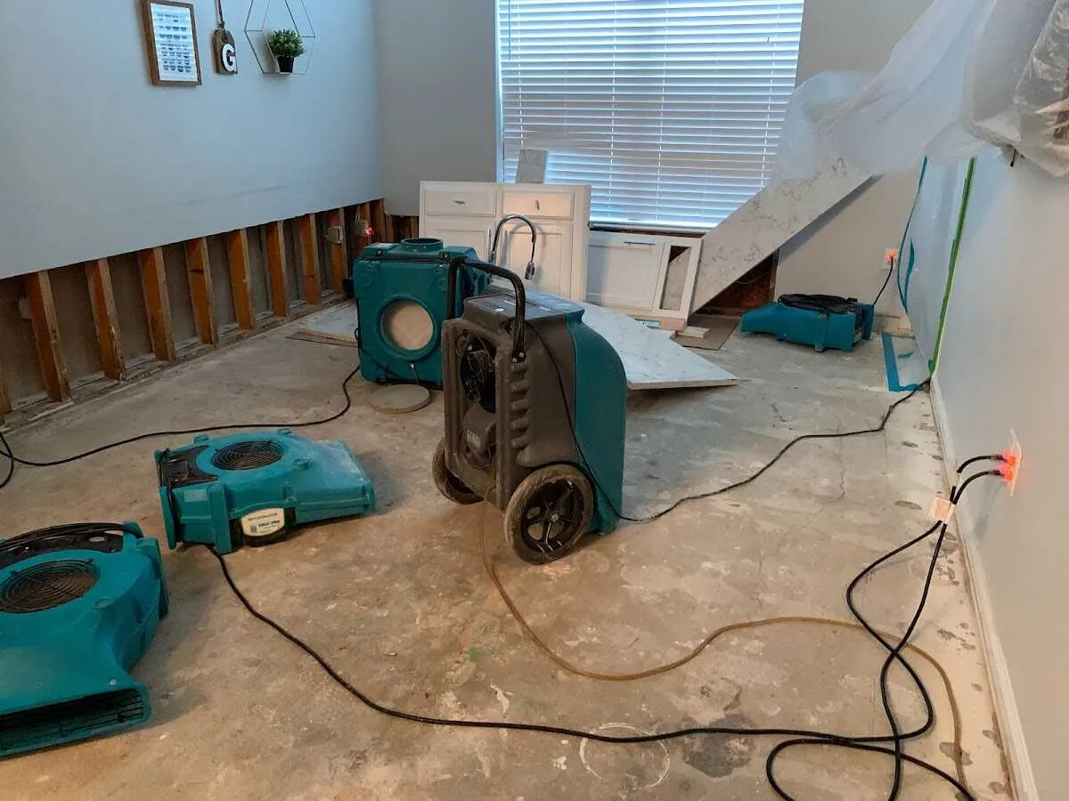 Dehumidifier in flood-cut room for Water Damage Restoration in Aberdeen